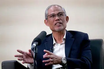 LAHIRKAN RASA SYUKUR: Menteri Bertanggungjawab bagi Ehwal Masyarakat Islam, Encik Masagos Zulkifli menasihatkan kesemua pelajar yang wajib mengikuti notis pengasingan 14 hari, "agar mematuhinya dengan sangat serius demi keselamatan negara". 