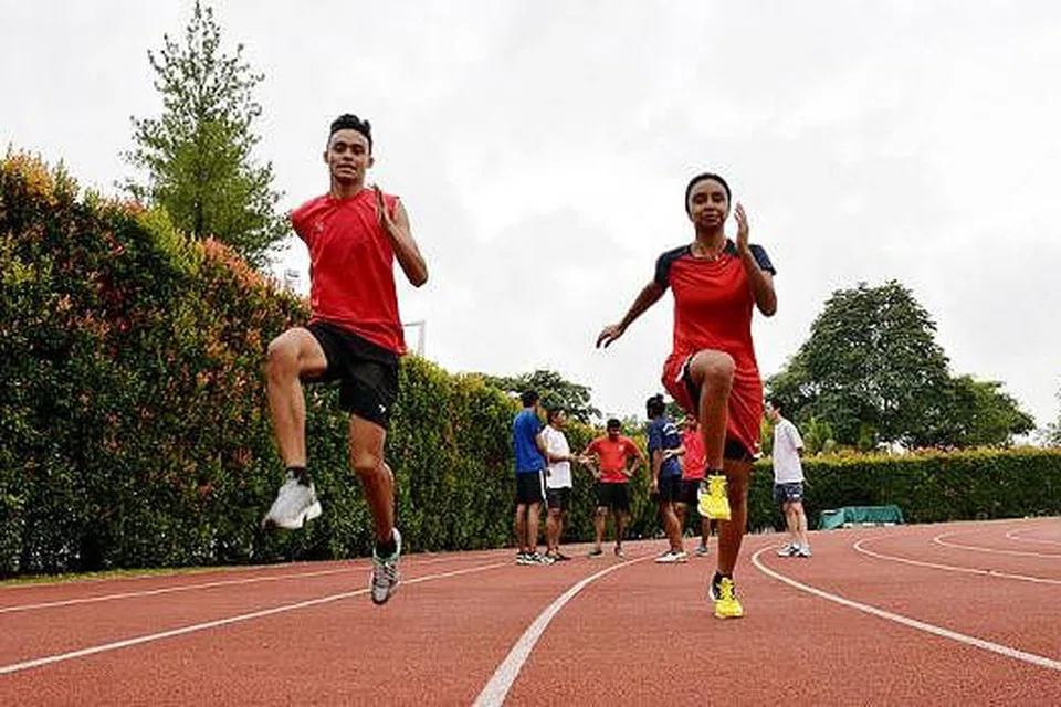 DAMBAKAN KEMENANGAN: Suhairi dan Salbiah berharap dapat menunjukkan prestasi terbaik di Sukan Para-Asean ketujuh dan meraih pingat untuk keluarga dan negara. Mereka adalah antara tujuh atlit balapan dan padang Singapura yang akan bertanding di Naypyidaw, Myanmar, bulan ini. - Foto-foto M.O. SALLEH 