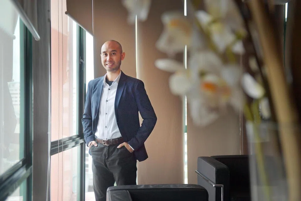 Pengarah Eksekutif AMP Singapore, Encik Mokhsin Rashid.