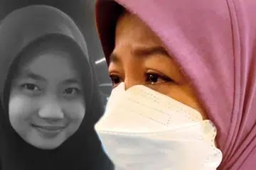 Cik Noraidah Lamat, 45 tahun (kanan) mahu pihak berkuasa menyiasat kes kematian anak tunggalnya, Allahyarham Zara Qairina Mahathir, 13 tahun, susulan spekulasi berhubung kematiannya dan berharap keputusan bedah siasat dapat membongkar kejadian sebenar.