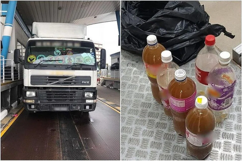 BAHAN TERLARANG: Empat botol cecair berwarna coklat yang dipercayai merupakan kratom ditemui dalam lori berdaftar Malaysia baru-baru ini. - Foto fail