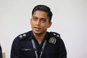 PERLU SENTIASA SEDIA: Meskipun pada mulanya meragui kemampuannya memegang jawatan inspektor di SPF, NSPI Tsaqif kini lebih bersedia melatih anggota ProCom di bawah kendaliannya bagi memastikan mereka menjalankan tugas dengan baik. - Foto THE STRAITS TIMES