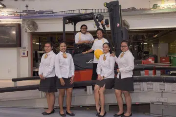 LESEN YANG DIBANGGAKAN: Sekumpulan gadis yang mengambil kursus Nitec dalam Khidmat Logistik di Institut Pendidikan Teknikal (ITE) Kolej Timur - (dari kiri) Cik Nur Sa'adatul Hanan, Cik Nurnaqiera Aqielah, Cik Nur Sa'adah, Cik Nayli Wirdani, Cik Siti Nur Khalisha dan Cik Nur Sofia - menyifatkan kemahiran memandu trak angkat susun atau 'forklift' sebagai bonus yang menekankan perihal disiplin dan kejituan kerja. - Foto BH oleh LEE JIA WEN