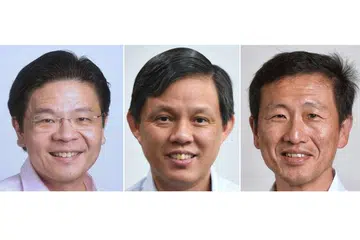 PERANAN BARU: Rombakan yang diumumkan PM Lee memperlihatkan pertukaran tugas menteri di beberapa kementerian, umumnya melibatkan pemimpin generasi keempat (4G) termasuk (dari paling kiri) Encik Wong, Encik Chan dan Encik Ong supaya mereka cepat meraih pengalaman dalam kepimpinan politik negara.