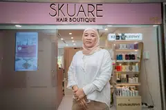 Cik Rudzaidah Darsurnik, yang lebih mesra dengan panggilan Zaidah, di hadapan Skuare Hair Boutique di tingkat lima Far East Plaza di Scotts Road.