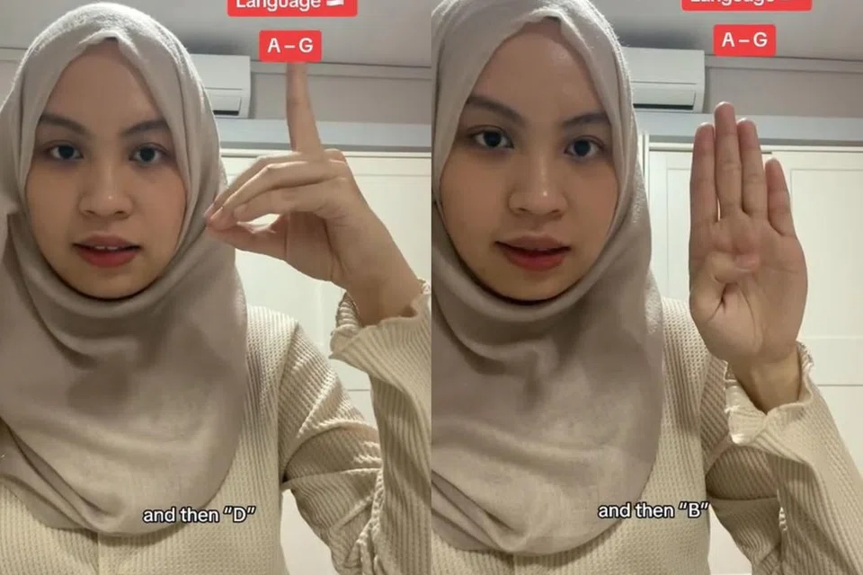 Cik Nur Aida Poh Muhammad Aizat Poh memanfaatkan wadah TikTok untuk mengajar asas Bahasa Isyarat Singapura (SgSL) kepada masyarakat umum.