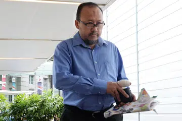PERBICARAAN MASUK HARI KE-13: Bekas presiden Majlis Pusat, Saharuddin Kassim, tiba di mahkamah untuk perbicaraannya. - Foto JOHARI RAHMAT