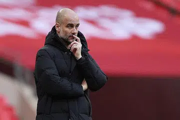 YAKIN JUARA SUDAH DALAM GENGGAMAN: Kemenangan City di Aston Villa memberinya kelebihan 11 mata ke atas Manchester United, dan pengurus City Pep Guardiola berkata pasukannya kini begitu hampir menjadi juara Liga Perdana. - Foto-foto EPA-EFE