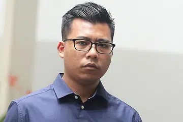 FAJAR ASHRAF: Melempar kucing dari tingkat 10 sebuah blok HDB dan kemudian menghentak kucing itu di atas tanah untuk memastikan ia mati. - Foto THE STRAITS TIMES