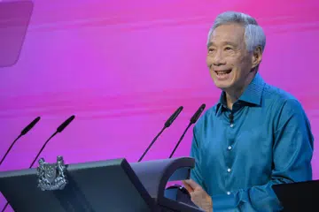 SEMANGAT SINGAPURA: Perdana Menteri Lee Hsien Loong ketengahkan langkah tangani pelbagai isu yang menjadi keprihatinan semasa berucap di Rapat Hari Kebangsaan. 