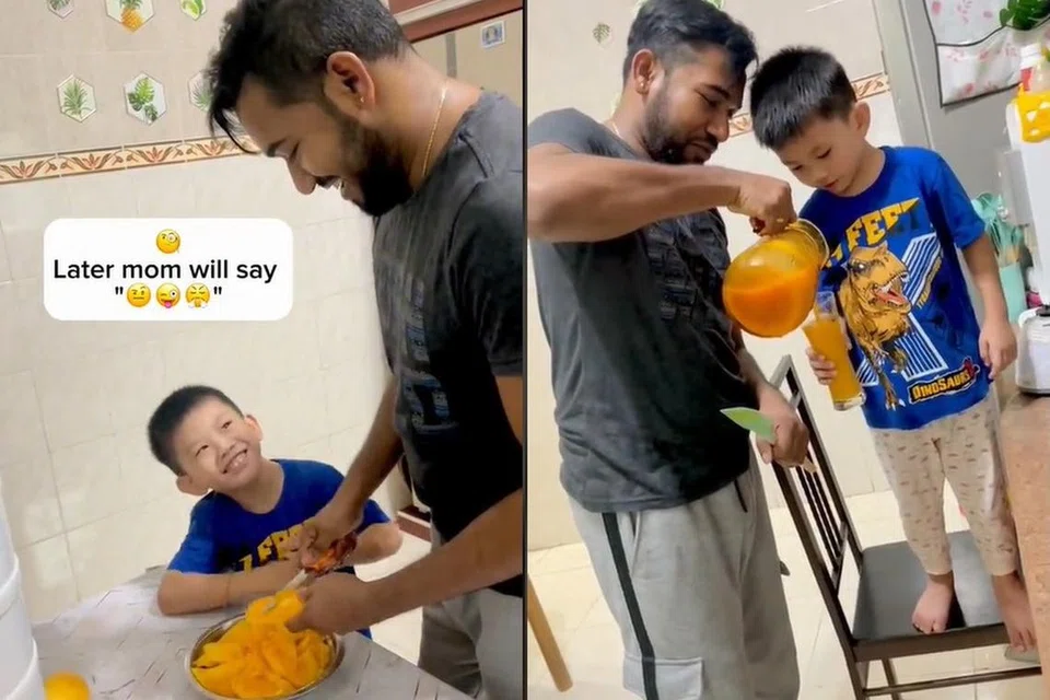 HUBUNGAN RAPAT: Kai Kai (baju biru) kelihatan menyediakan minuman jus Lassi Mangga dengan bertutur dalam bahasa Tamil bersama jirannya Encik Kartik Suresh (baju hitam).