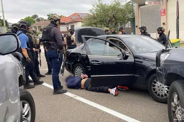Polis New South Wales menangkap tiga suspek lelaki yang dipercayai cuba melakukan serangan dekat sebuah pusat jagaan di Sydney pada 7 Oktober 2005.