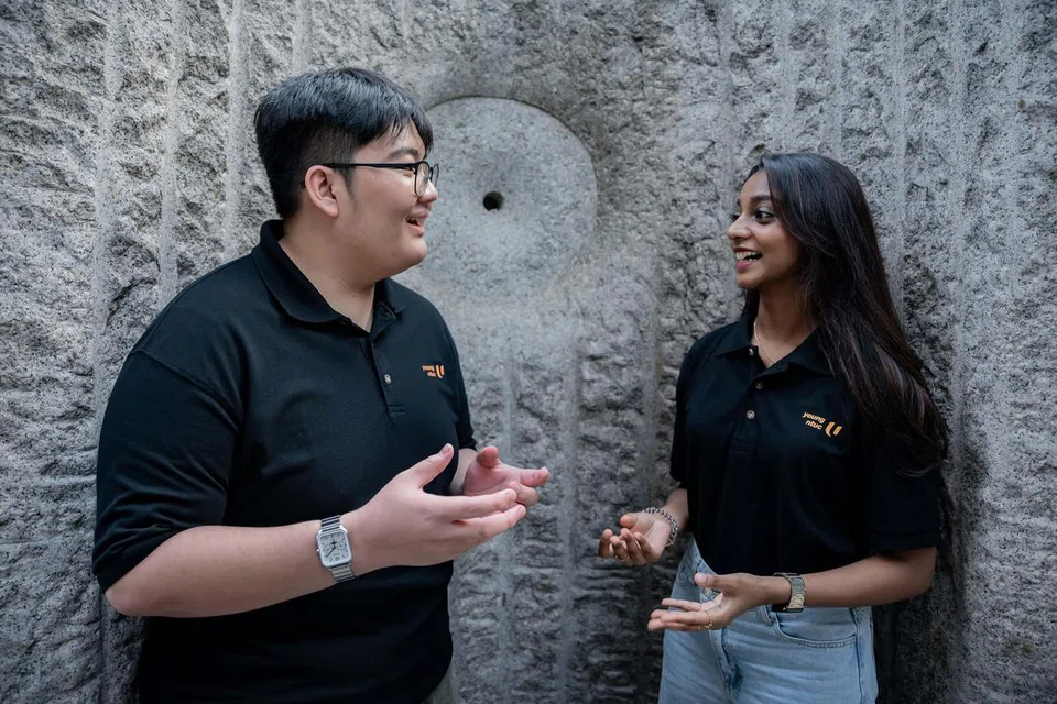 Encik Salimul Fikri Mohammad Salman (kiri) dan Cik Shafrin Farzana Shaik Dawood (kanan) antara ahli jawatankuasa penganjur belia bagi acara sambutan Perbarisan Hari Kebangsaan (NDP) 2024 di Promontory @ Marina Bay. Acara ini adalah menerusi kerjasama Jawatankuasa Eksekutif NDP dan Kongres Kesatuan Sekerja Kebangsaan (NTUC). 