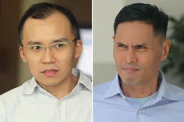 DIDAKWA MAIN PERANAN: Dua pegawai SCDF, Kenneth Chong (kiri) dan Nazhan, kedua-duanya didakwa terlibat dalam kes kematian Koperal Kok.
