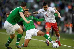 KEKAL REKOD TANPA KALAH: Pemain Gibraltar, Joseph Chipolina diasak pemain Ireland, Callum Robinson pada perlawanan Kumpulan D kelayakan Euro 2020 di Dublin, awal pagi semalam. - Foto Reuters