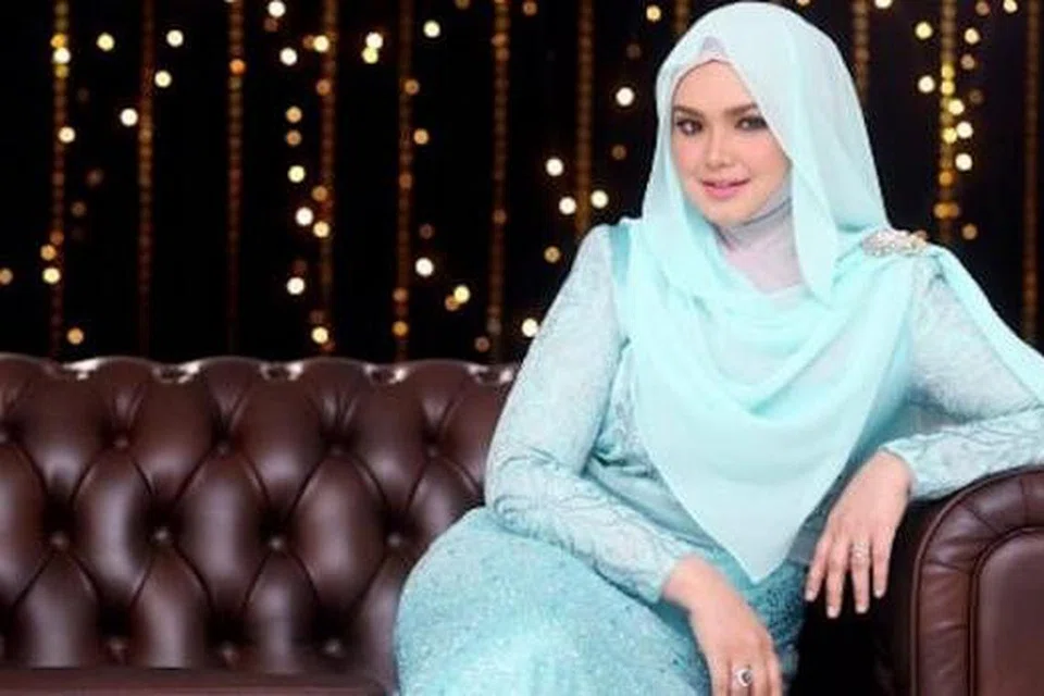 HARAPAN MURNI: Penyanyi Siti Nurhaliza menjelaskan bahawa dia mahu lebih fokus untuk hamil pada tahun ini selain mengehadkan pembabitannya dalam bidang nyanyian. - Foto Rotikaya.com