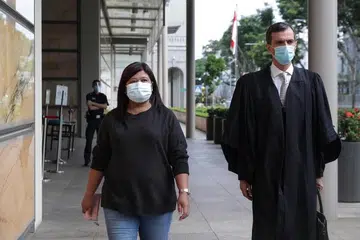 Cik Parti Liyani dan peguamnya, Encik Anil Balchandani. - Foto fail