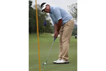 ASAL SUSAH: Dari latar belakang susah Encik Mardan jadi pemain golf nombor satu Singapura. - Foto fail