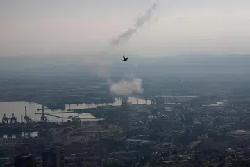 Asap berkepul apabila sistem antipeluru berpandu ‘Iron Dome’ Israel, memintas roket yang dilancarkan dari Lebanon, ke arah Israel pada 27 September, di tengah-tengah konflik rentas sempadan antara Hezbollah dengan Israel.