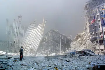 SISA RUNTUHAN: Gambar fail yang diambil pada 11 September 2001 menunjukkan sisa-sisa bangunan Pusat Dagangan Dunia di New York yang runtuh susuli serangan pengganas. - Foto AFP
