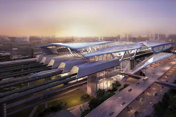 PERBINCANGAN: PM Lee dan Tan Sri Muhyiddin berbincang mengenai projek HSR semalam. Gambar atas merupakan lakaran artis mengenai salah satu stesen HSR di Bandar Malaysia. - Foto EDELMAN