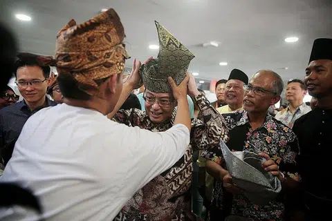 BERSAMA SEJAK 2011 Di GRC TAMPINES: Encik Masagos bersama DPM Heng dalam acara Bulan Bahasa di Tampines West CC pada 21 September 2019. - Foto fail