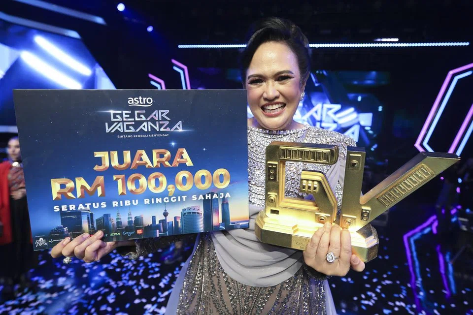 Liza Aziz ingin membawa kakaknya, Azlina Aziz, serta kru yang menyokongnya di ‘Gegar Vaganza 11’ (GV11) menunaikan umrah, berbekal wang tunai RM100,000 ($30,266) yang dimenangi.