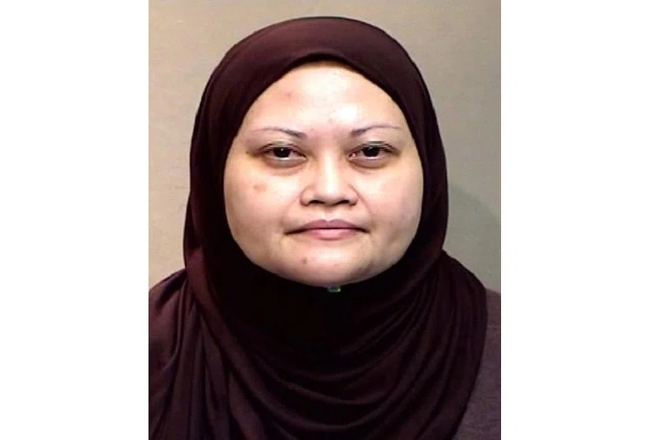 DIDAPATI BERSALAH: Arni Ahmad, yang menipu Persatuan Jimat Cermat dan Pinjaman Koperatif Pekerja Lembaga Badan Berkanun Singapura, dihukum penjara selama 12 tahun pada 15 Ogos lalu. - Foto PASUKAN POLIS SINGAPURA