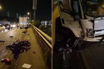 NAHAS JALAN RAYA: Seorang lelaki berusia 21 tahun dan seorang lagi yang berusia 42 tahun terkorban dalam kemalangan di Koswe Woodlands awal pagi semalam. - Foto FACEBOOK JHONSON GRACE SINNAPAN