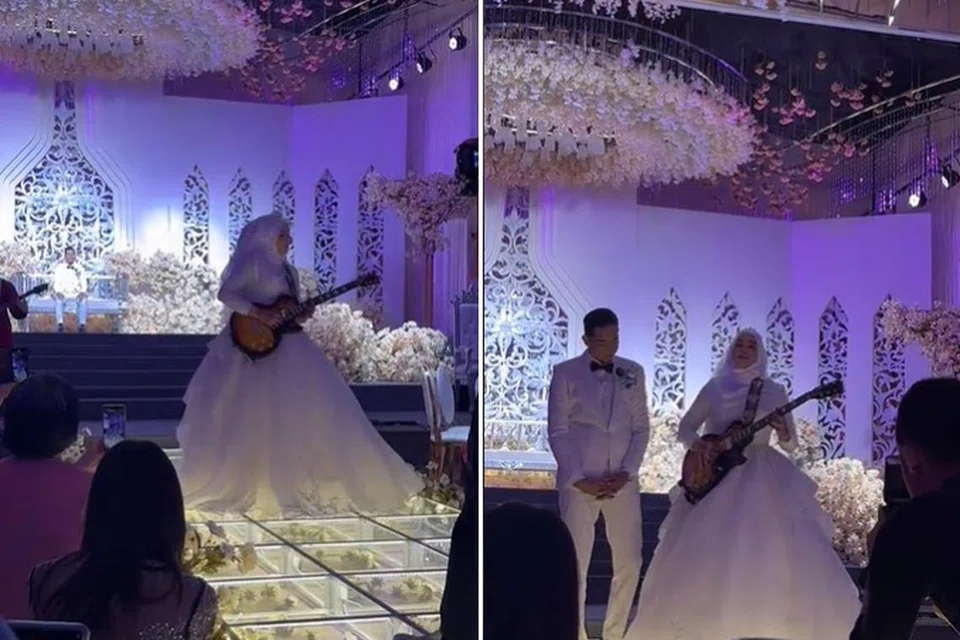 PERSEMBAHAN KHAS: Mantan gitaris kumpulan Xpose Band, Cik Nureen Qistina, membuat persembahan gitar ‘solo’ semasa majlis walimah beliau.
