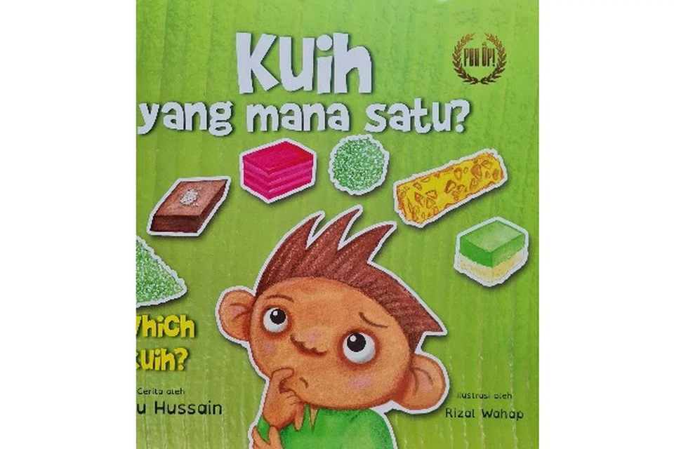 Kuih Yang Mana Satu?
Nombor Panggilan: J SING IDA

“Ada terlalu banyak kuih di depan mata; yang mana satu patut saya beli buat berbuka?”, tanya seorang kanak-kanak lelaki yang sedang berada di bazar Geylang Serai bersama kakaknya untuk membeli juadah berbuka puasa. Kuih yang mana satukah akan jadi pilihannya?