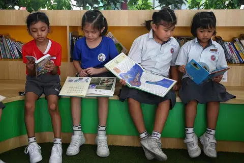 TIDAK UNIK: PIRLS dijalankan ke atas murid Darjah 4 di serata dunia sekali setiap lima tahun. MOE berkata dapatannya tidak unik kepada Singapura, dan kemerosotan dalam keseronokan membaca mungkin sebahagiannya disebabkan pertumbuhan pesat hiburan dan format kandungan lain. 