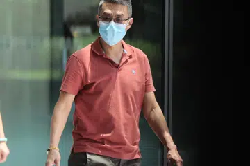 Derrick Ho Chiak Hock didakwa mengambil wang sogokan daripada pekerja migran selama enam tahun untuk pembaharuan permit kerja mereka, dihukum penjara 24 bulan.