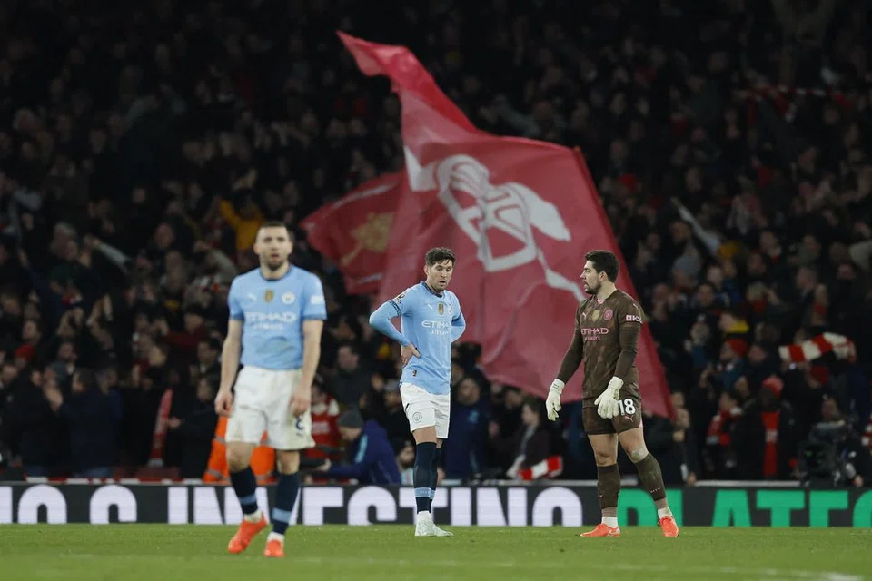 Pemain pertahanan Manchester City, John Stones (tengah), berkata prestasi pasukannya pada separuh masa kedua tidak boleh diterima. 