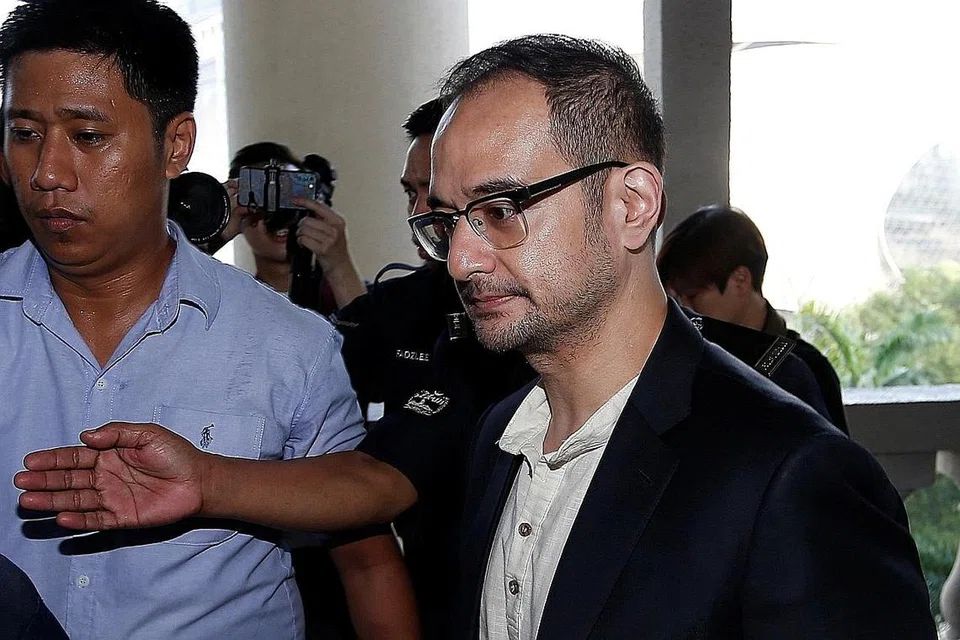 MENGAKU TIDAK BERSALAH: Riza Shahriz (atas) mengaku tidak bersalah terhadap semua pertuduhan. - Foto REUTERS