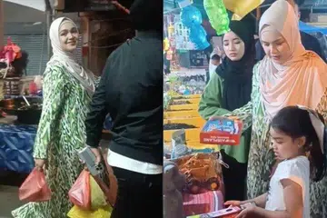Datuk Seri Siti Nurhaliza dan anaknya, Siti Aafiyah Mohd Khalid, dirakam berjalan-jalan di pasar malam sekitar Kuala Lipis, Pahang.