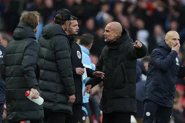 GUARDIOLA JADI SASARAN: Pengurus Man City Pep Guardiola, dilontar syiling oleh para penyokong Liverpool di Anfiled. Bagaimanapun tidak satu pun yang mengenainya. - Foto REUTERS