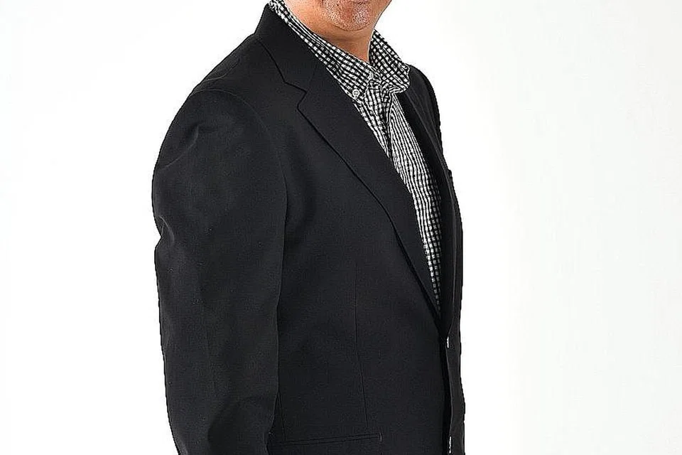 NORMAN SAWI 