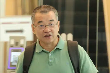 Zhang Shuyan, 59 tahun, merupakan pengarah urusan syarikat penyelenggaraan dan pemasangan elektrik dan mekanikal FYH Integrated pada masa kesalahan dilakukan.