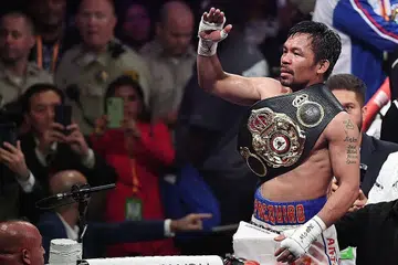 MASIH BERBISA: Manny Pacquiao meraikan kejayaan mengalahkan Keith Thurman menerusi kiraan mata, sekali gus merebut gelaran kelas welterweight WBA di Arena MGM Grand Garden, Nevada, pada 20 JUlai lalu. - Foto AFP