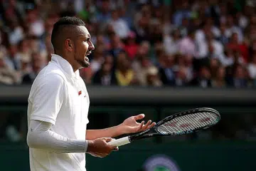 UNIK DAN MENGUNDANG PELBAGAI TANGGAPAN: Nick Kyrgios mengakui bahawa beliau ada kalanya melakukan sesuatu atau 'berdrama' dalam gelanggang untuk menghiburkan peminat. - Foto REUTERS, fail