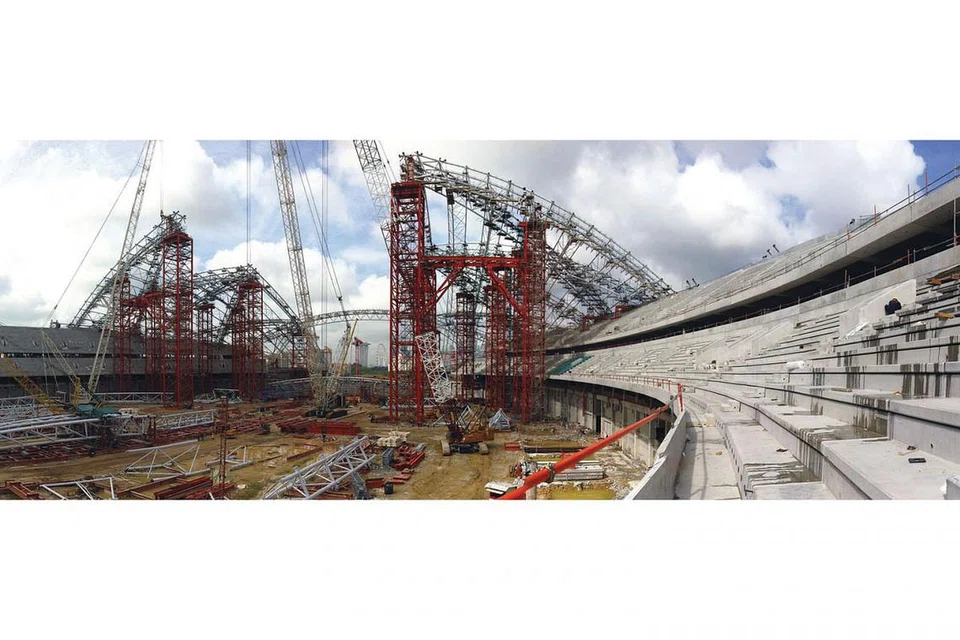 BUAHKAN HASIL: Reka bentuk Hab Sukan Singapura berkonsepkan semangat Sukan Singapura, selaras dengan Visi 2030 yang mahukan semua rakyat di Singapura untuk melibatkan diri dalam acara sukan. Kejuruteraan reka bentuk ini diketuai oleh Arup yang merupakan pakar global dalam reka bentuk stadium. - Foto Fail 