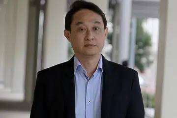 CUBA LARIKAN DIRI: Chew Eng Han akan menjalani hukuman penjara 13 bulan kerana cuba tinggalkan Singapura dengan cara tidak sah, selepas selesai menjalani hukuman penjara tiga tahun empat bulan kerana salah guna dana gereja. - Foto fail