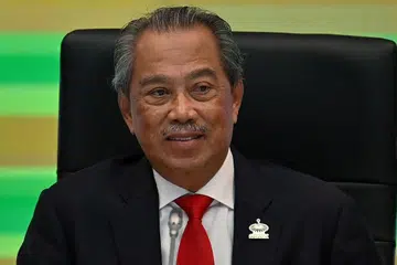 TAN SRI MUHYIDDIN YASSIN: Beri keterangan di Putra Jaya.