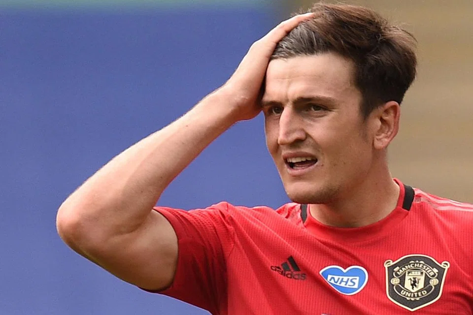 Kapten Manchester United Harry Maguire (gambar atas) - Foto REUTERS