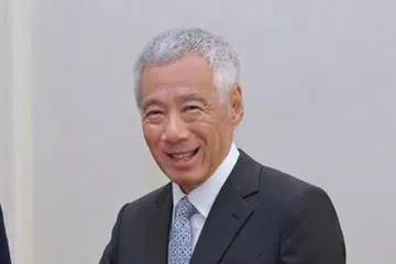BOLEH CAPAI SASARAN: Encik Lee Hsien Loong berkata Apec boleh capai sasaran tenaga bersih dengan lebih pantas dengan mengerahkan model teknologi dan kewangan baru