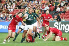 PENDAPATAN SENDIRI: Rugby Singapore (RSG) mula ditubuhkan sebagai unit perniagaan tersendiri SRU bagi menganjurkan kejohanan Ragbi Tujuh Sepasukan (7s) Singapura HSBC. Mereka telah membuat keuntungan tidak lebih daripada $750,000 dari acara itu, yang menelan belanja antara $6 juta hingga $7 juta untuk dianjurkan. - Foto fail