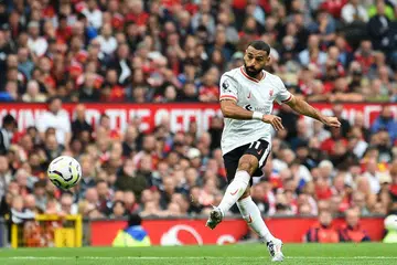 Penyerang Liverpool, Mohamed Salah, menjaringkan gol ketiga pasukannya dalam perlawanan menentang Manchester United di Old Trafford pada 1 September. 