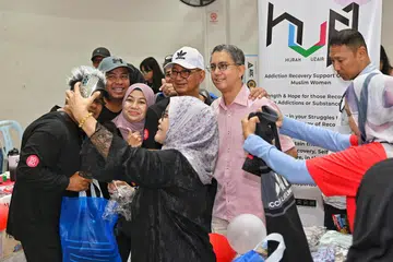 Singapura, Dr Muhammad Faishal Ibrahim, bekas pesalah, penjaga, sokongan, pemulihan, Fund the Fight Fiesta SG60, Kelab Masyarakat Kampong