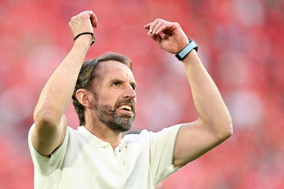 Ketua jurulatih England, Gareth Southgate, kegembiraan selepas pasukannya memenangi perlawanan suku akhir Euro 2024 menentang  Switzerland.